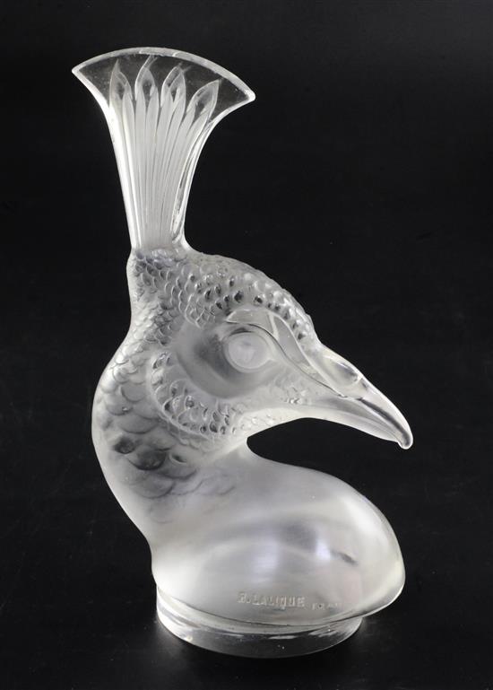 Tête de Paon/Peacocks head. A glass mascot by René Lalique, introduced on 3/2/1928, No.1140 Height 17.5cm.